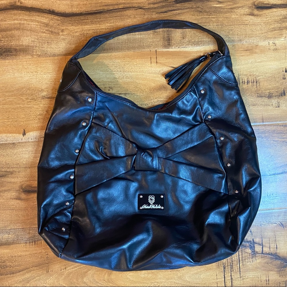 Metal Mulisha purse.